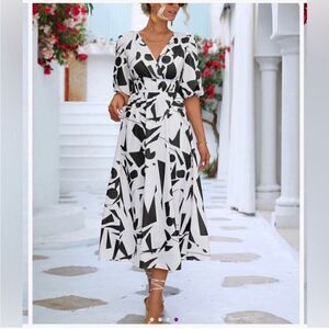 NWT La Mode Black and Ivory Surplice Dress with bubble Sleeves